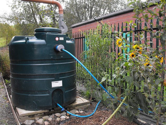 Rainwater harvesting system diagram for regenerative gardening.